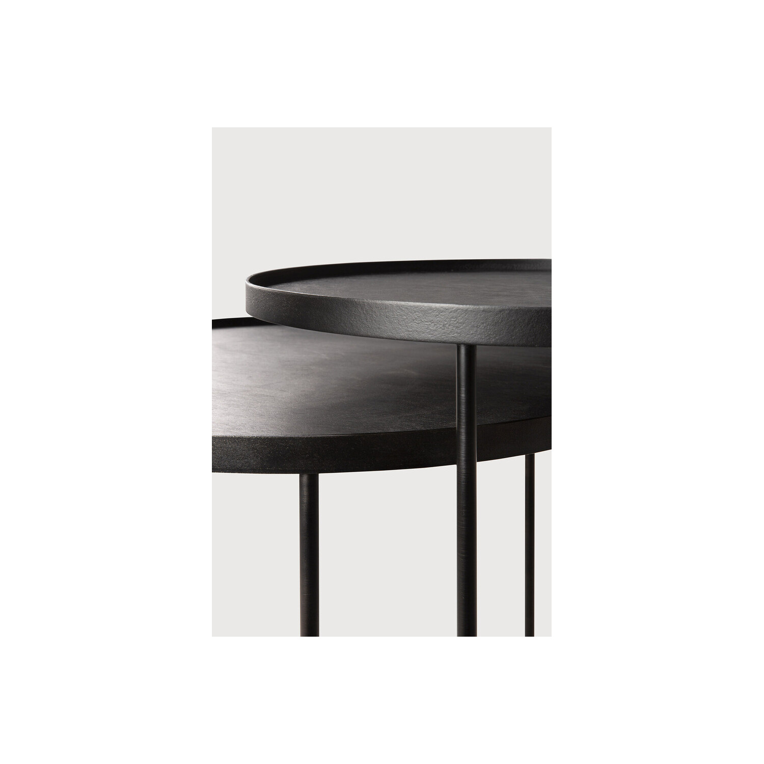 Set of Ethnicraft round occasional tables with S and L tops